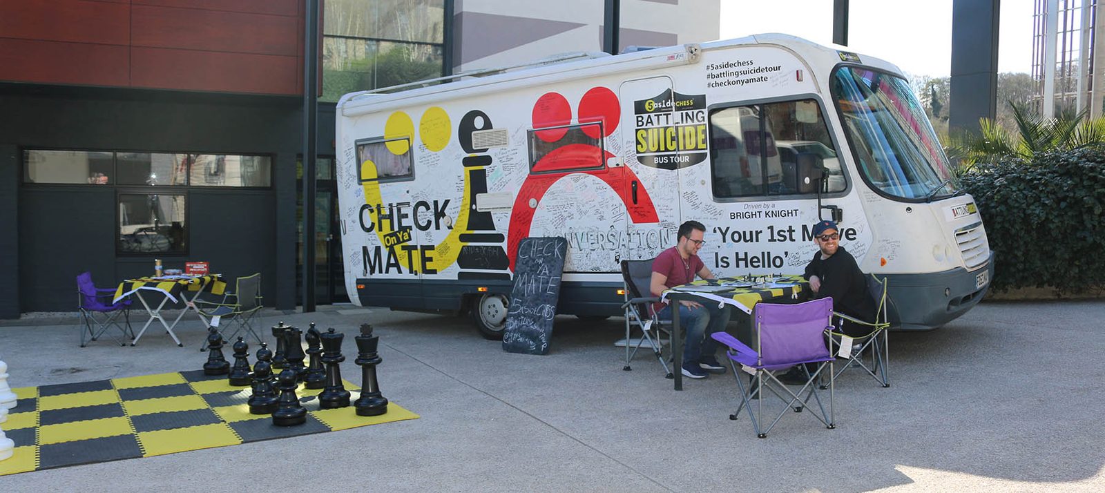 The Battling Suicide Bus and a giant chess set outside the University of Winchester